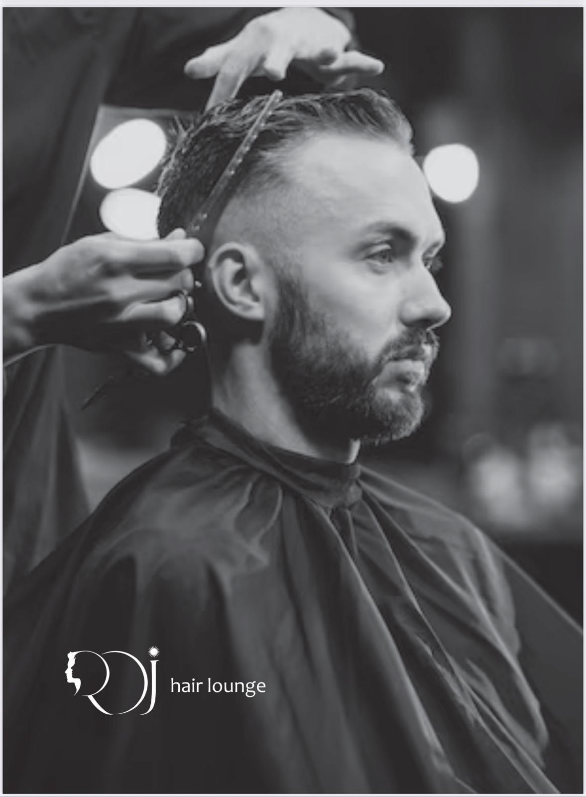 Precision haircut in progress at ROJ Hair Lounge